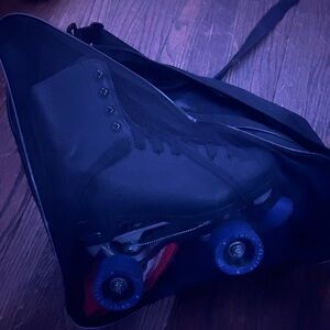 Black Roller Skates with Blue Wheels